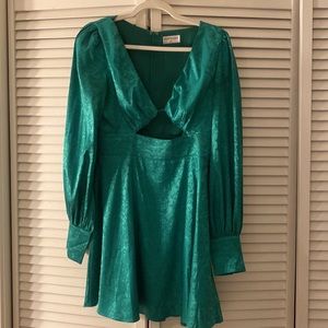 Medium emerald green mini dress for “Runaway the label”